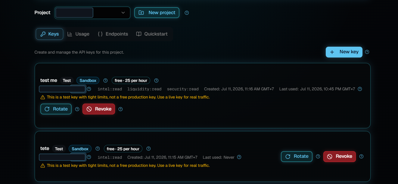 The Keys tab of the Developers page listing two test keys with their hourly limit, permissions, created and last used times, and Rotate and Revoke buttons.