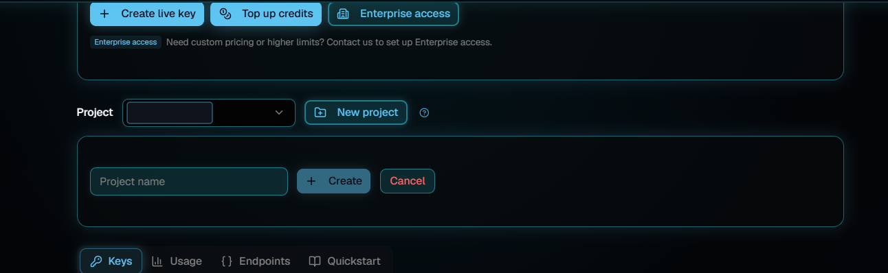 A cropped Developers page showing Create live key, Top up credits and Enterprise access buttons, a project picker with a New project button, and an open form with a Project name field beside Create and Cancel.
