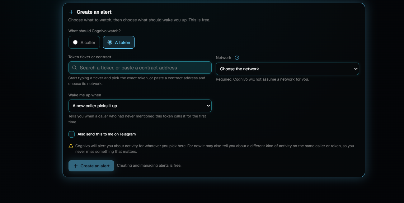 The Create an alert form with A token selected, showing a token ticker or contract search box, a Network dropdown set to Choose the network, a Wake me up when dropdown set to A new caller picks it up, a Telegram checkbox and a Create an alert button.